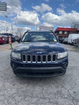 2014 Jeep Compass for sale at King of Auto in Stone Mountain GA