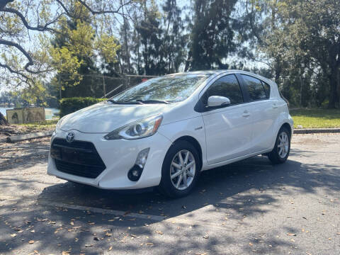 2015 Toyota Prius c for sale at ARISE MOTORS in Pompano Beach FL