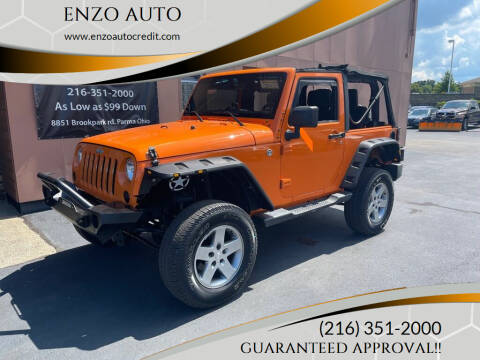 2013 Jeep Wrangler for sale at ENZO AUTO in Parma OH