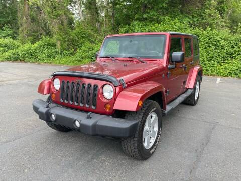 2012 Jeep Wrangler Unlimited for sale at Trucks Plus in Seattle WA
