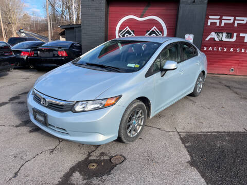 2012 Honda Civic for sale at Apple Auto Sales Inc in Camillus NY