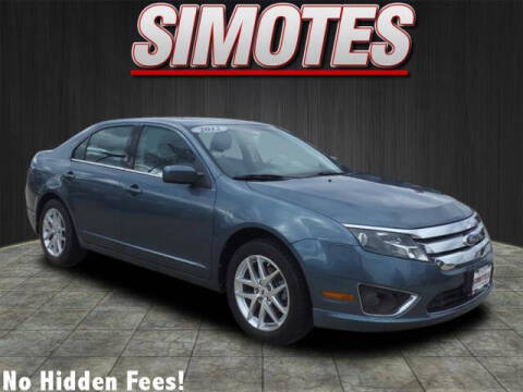 2012 Ford Fusion for sale at SIMOTES MOTORS in Minooka IL