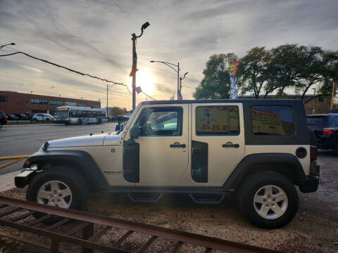 2009 Jeep Wrangler Unlimited for sale at ROCKET AUTO SALES in Chicago IL