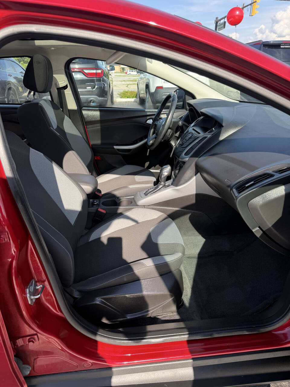 Red 2012 Ford Focus SE SE 4dr Sedan 23