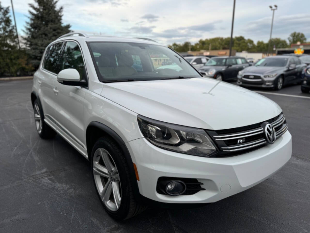 2014 Volkswagen Tiguan for sale at Opus Motorcars in Utica, MI