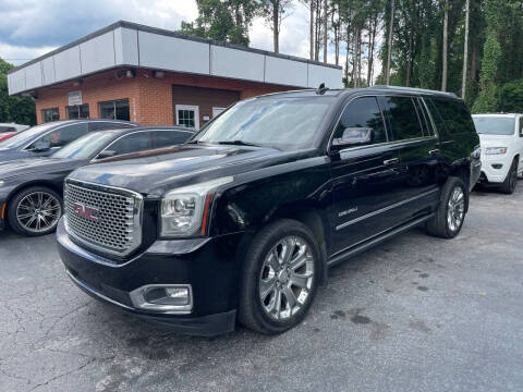 2016 GMC Yukon XL for sale at Magic Motors Inc. in Snellville GA