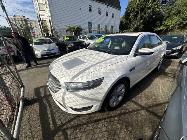 2014 Ford Taurus for sale at 77 Auto Mall in Newark, NJ