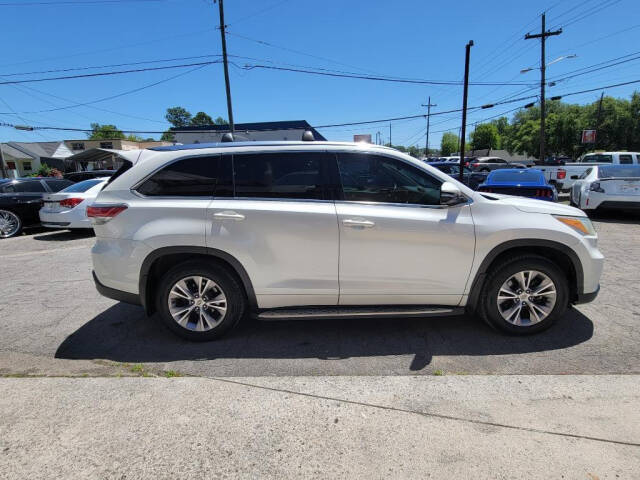 2015 Toyota Highlander for sale at DAGO'S AUTO SALES LLC in Dalton, GA