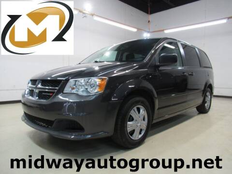 2012 Dodge Grand Caravan for sale at Midway Auto Group in Addison TX