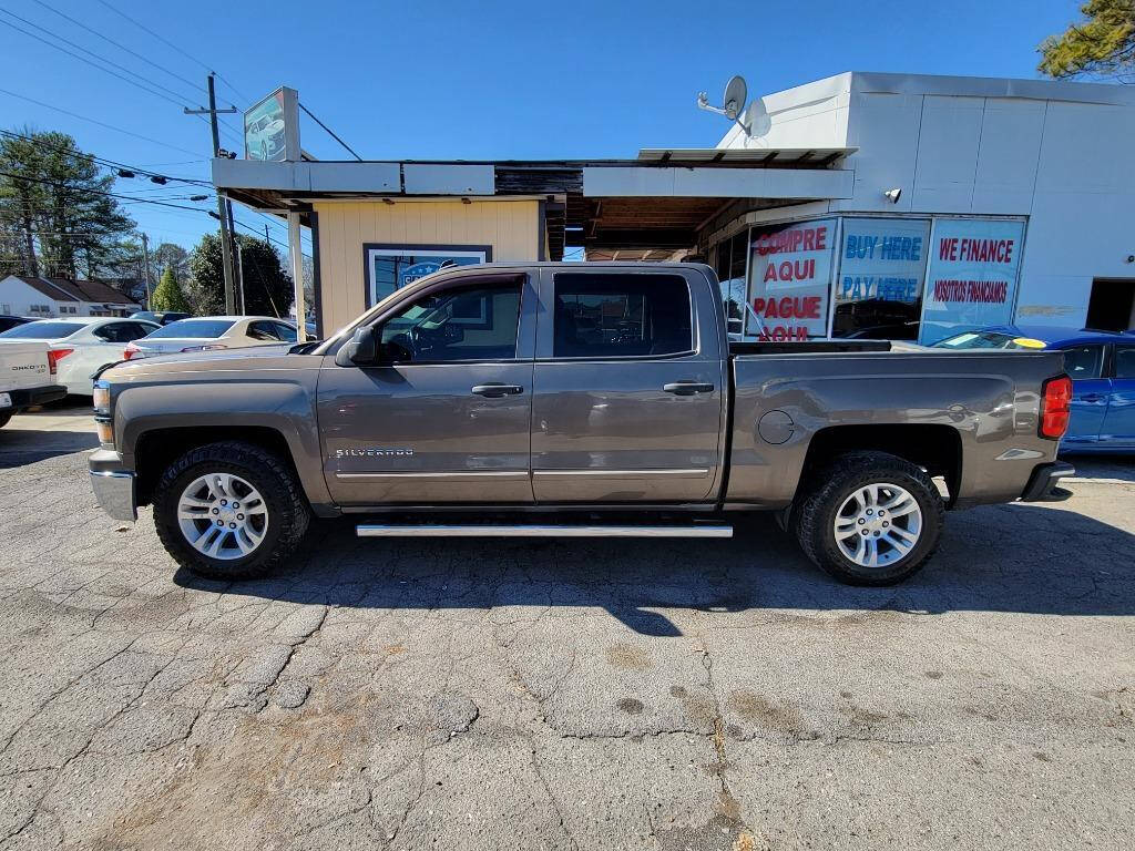 2014 Chevrolet Silverado 1500 for sale at DAGO'S AUTO SALES LLC in Dalton, GA