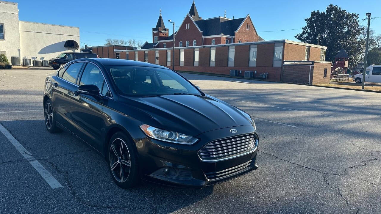 2014 Ford Fusion for sale at Caropedia in Dunn, NC