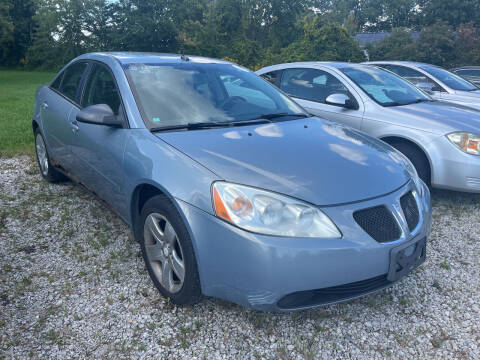 2009 Pontiac G6 for sale at HEDGES USED CARS in Carleton MI