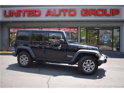 2015 Jeep Wrangler Unlimited for sale at United Auto Group in Putnam CT