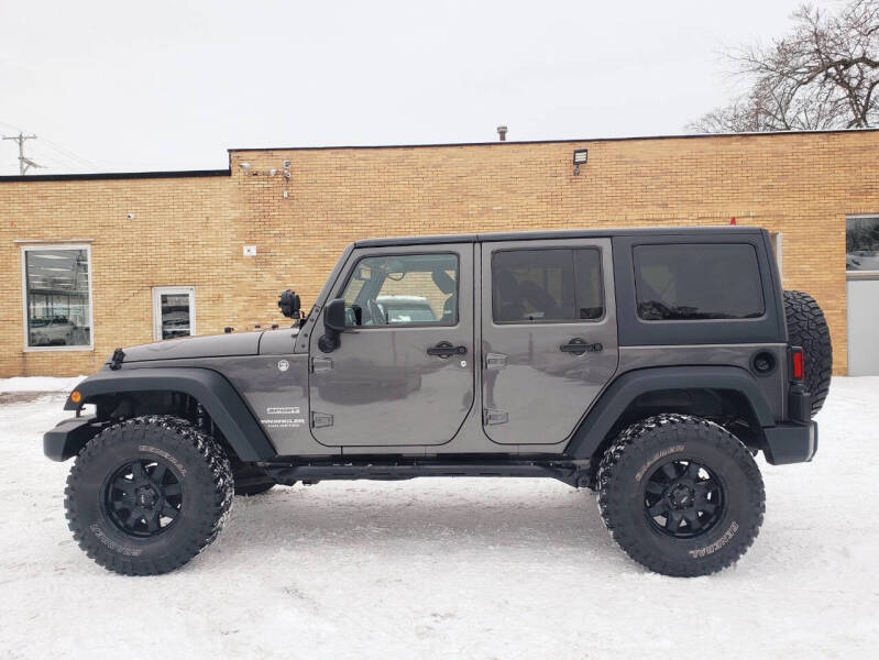 2014 Jeep Wrangler Unlimited for sale at Auto Sport INC in Grand Rapids MI