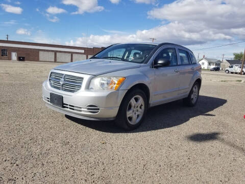 2009 Dodge Caliber for sale at KHAN'S AUTO LLC in Worland WY
