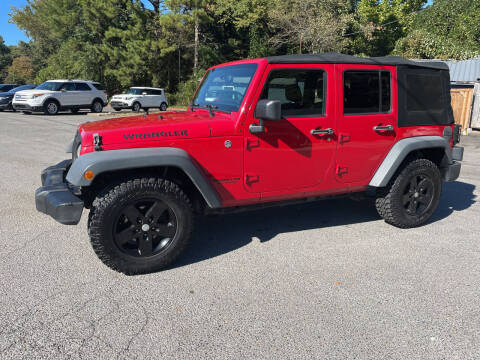2014 Jeep Wrangler Unlimited for sale at Adairsville Auto Mart in Plainville GA