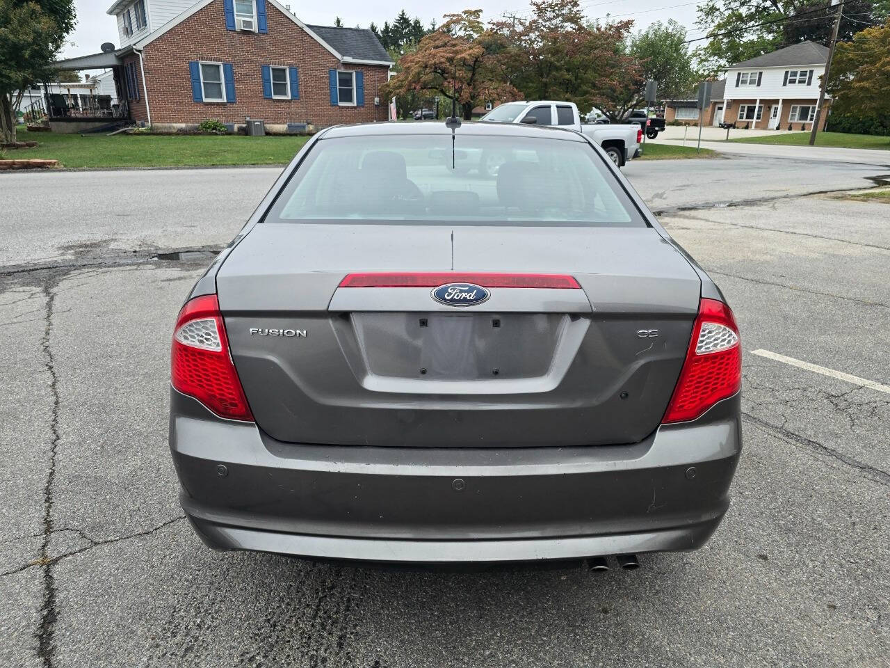 2011 Ford Fusion for sale at QUEENSGATE AUTO SALES in York, PA