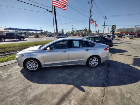 2013 Ford Fusion for sale at BIG 7 USED CARS INC in League City TX