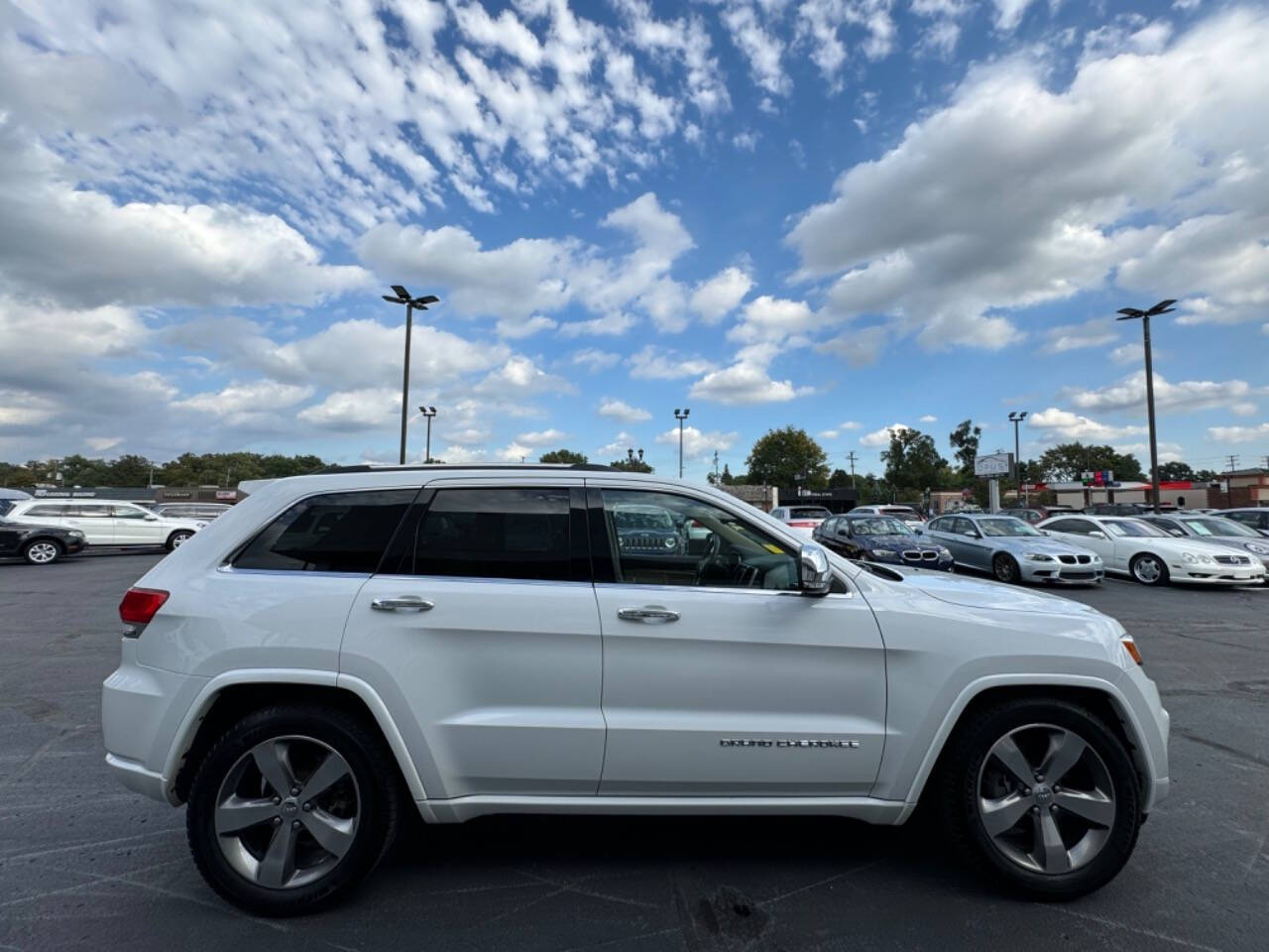 2015 Jeep Grand Cherokee for sale at Opus Motorcars in Utica, MI