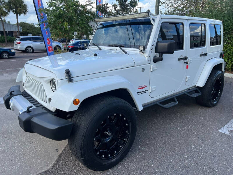 2013 Jeep Wrangler Unlimited for sale at Bay City Autosales in Tampa FL