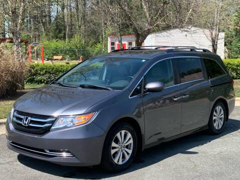 2014 Honda Odyssey for sale at Triangle Motors Inc in Raleigh NC