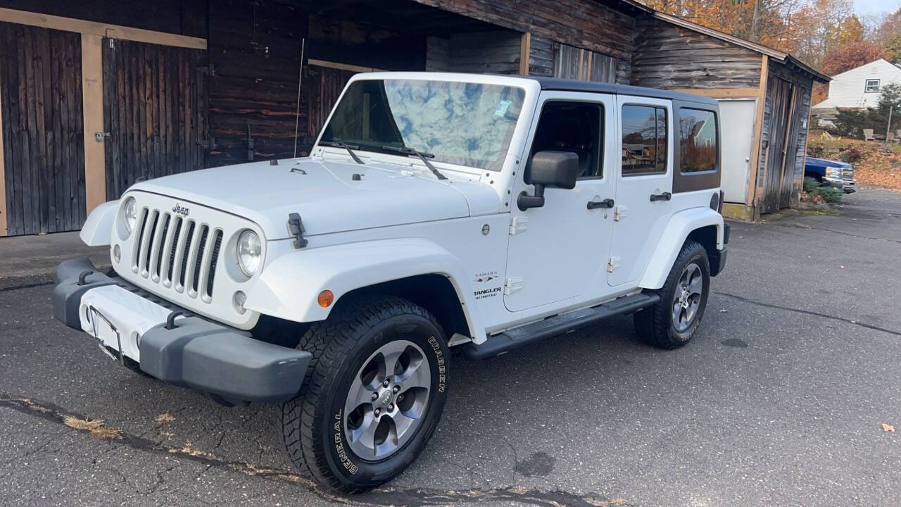 2016 Jeep Wrangler Unlimited for sale at Drive X in Oakville, CT