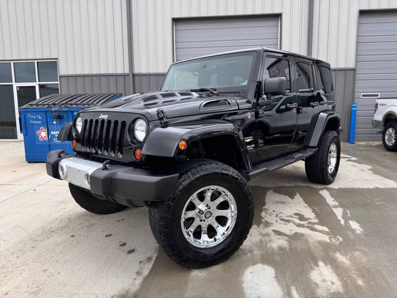 2011 Jeep Wrangler Unlimited for sale at Andover Auto Group, LLC. in Argyle TX