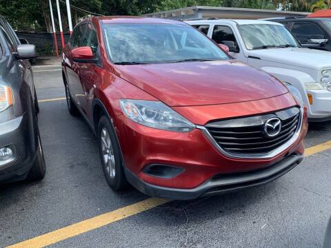 2014 Mazda CX-9 for sale at America Auto Wholesale Inc in Miami FL