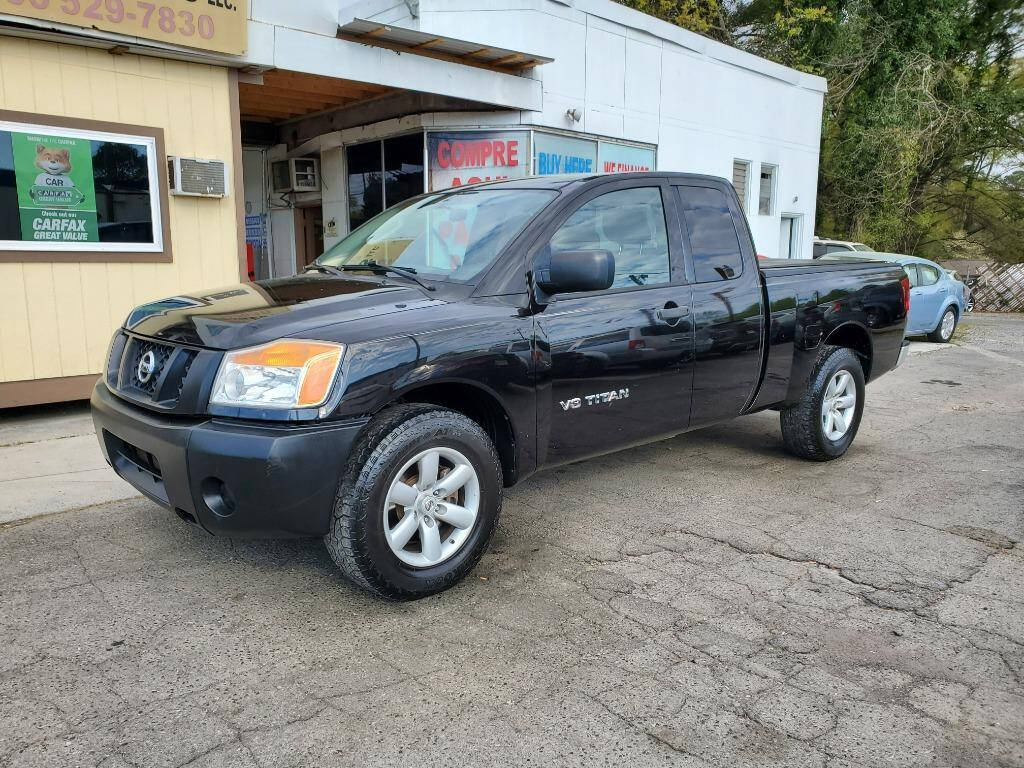 2011 Nissan Titan for sale at DAGO'S AUTO SALES LLC in Dalton, GA