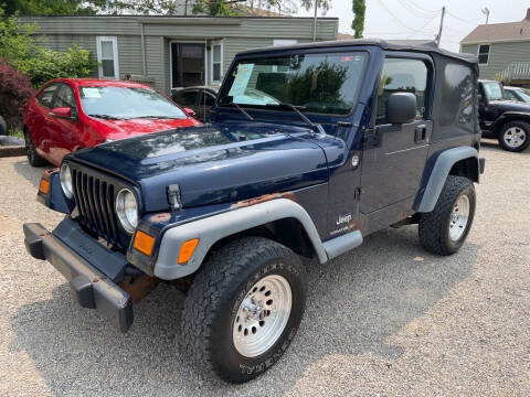 2006 Jeep Wrangler for sale at TIM'S AUTO SOURCING LIMITED in Tallmadge OH