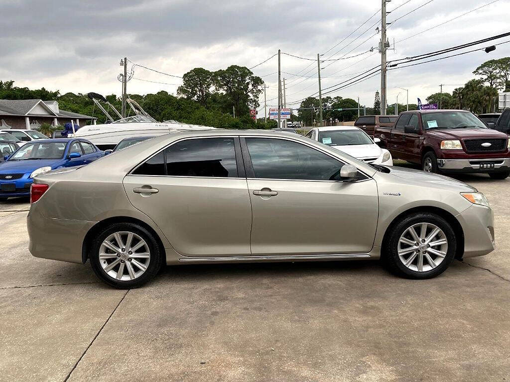 2014 Toyota Camry for sale at We Buy & Sell Cars Inc in Orlando, FL