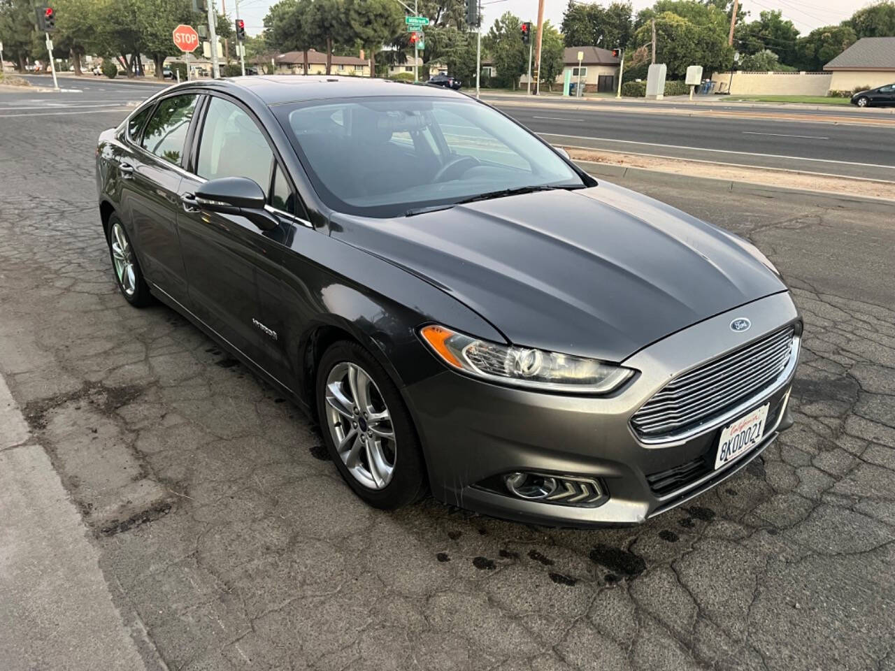 2016 Ford Fusion Hybrid for sale at AUTO 4 LESS in Fresno, CA