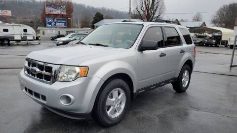 2009 Ford Escape for sale at MCMANUS AUTO SALES in Knoxville TN