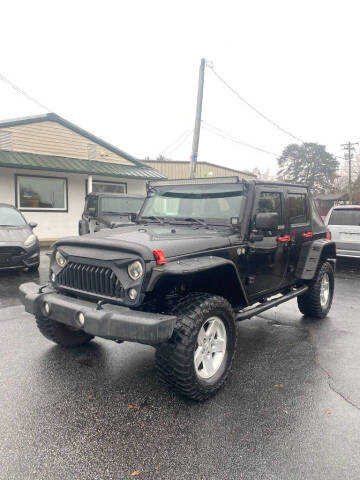 2013 Jeep Wrangler Unlimited for sale at A & H Auto Sales in Greenville SC