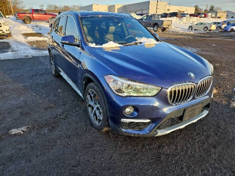 2018 BMW X1 for sale at BETTER BUYS AUTO INC in East Windsor CT
