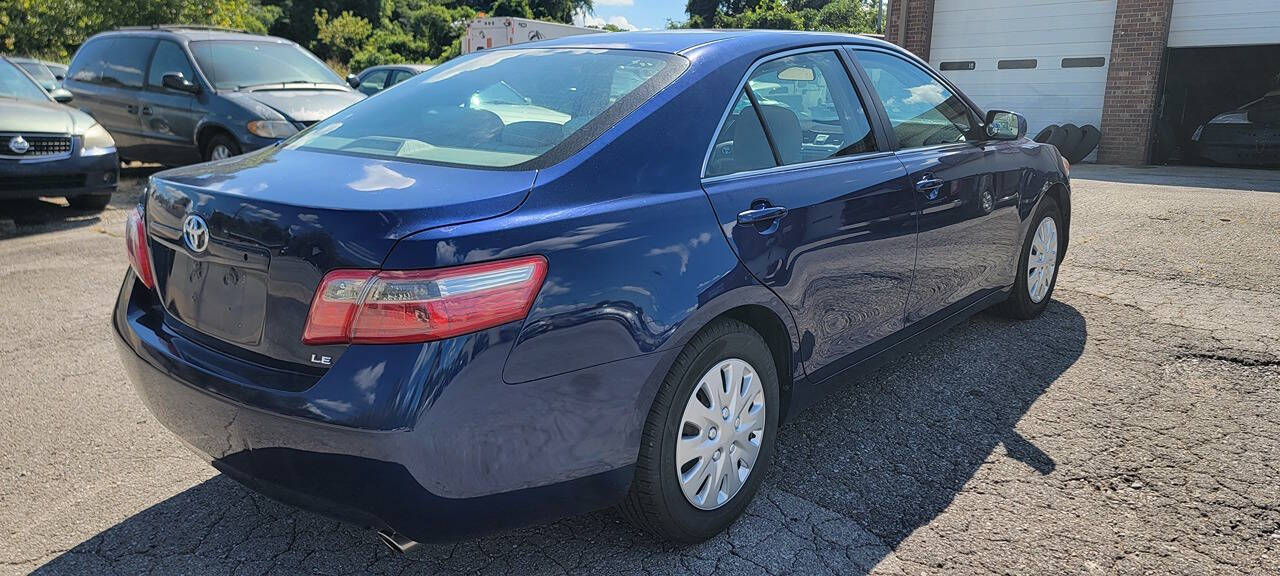 2007 Toyota Camry for sale at Cars For Less in Clarksville, TN