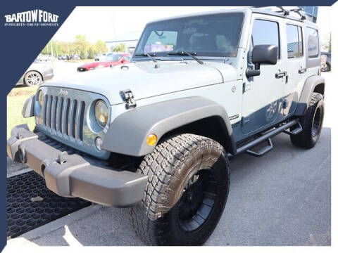 2014 Jeep Wrangler Unlimited for sale at BARTOW FORD CO. in Bartow FL