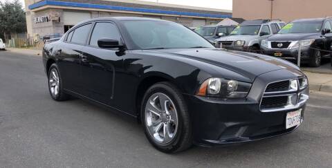 2014 Dodge Charger for sale at Cars 2 Go in Clovis CA