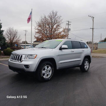 2011 Jeep Grand Cherokee for sale at Ideal Auto Sales, Inc. in Waukesha WI