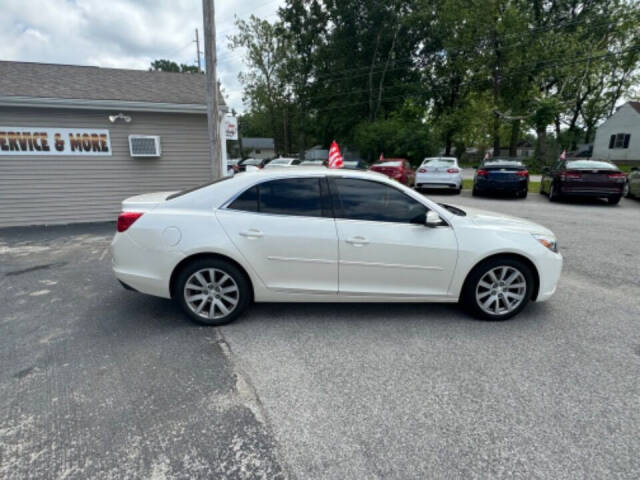 2013 Chevrolet Malibu for sale at Mitrione Motors in Springfield, IL