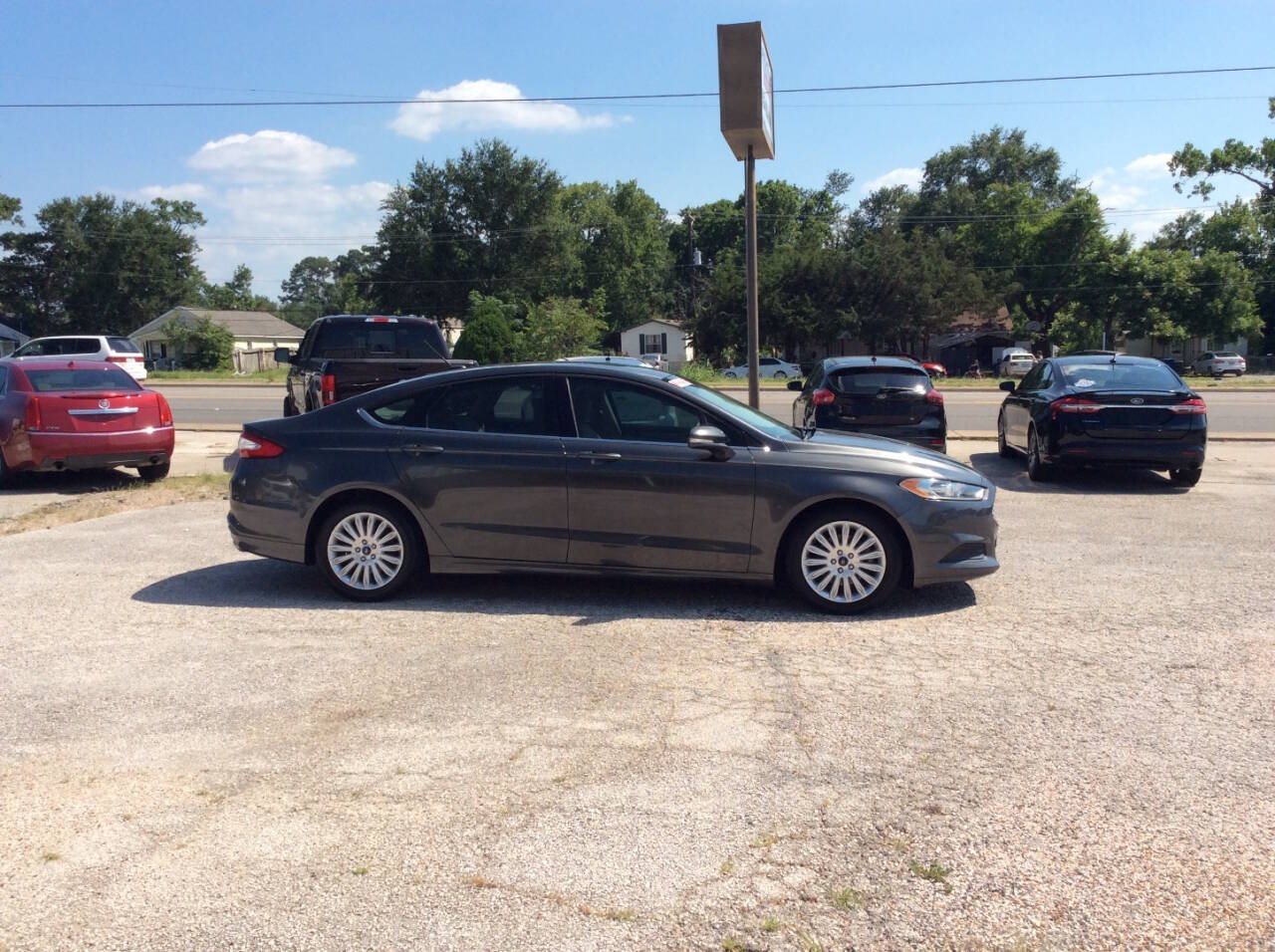 2016 Ford Fusion Hybrid for sale at SPRINGTIME MOTORS in Huntsville, TX