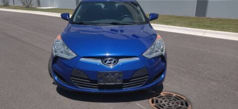 2012 Hyundai Veloster for sale at ACTION AUTO GROUP LLC in Roselle IL