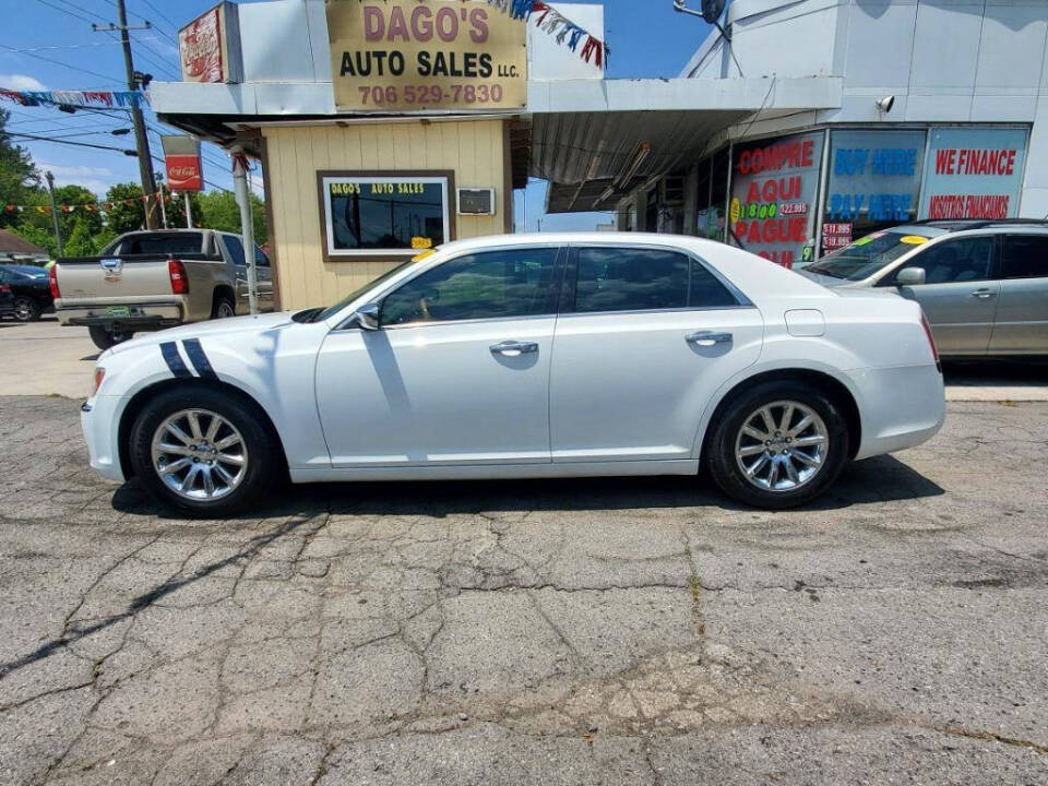 2014 Chrysler 300 for sale at DAGO'S AUTO SALES LLC in Dalton, GA