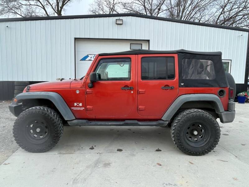 2009 Jeep Wrangler Unlimited for sale at A & B AUTO SALES in Chillicothe MO