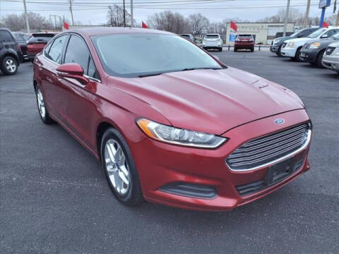 2013 Ford Fusion for sale at Credit King Auto Sales in Wichita KS