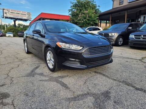 2014 Ford Fusion for sale at King of Auto in Stone Mountain GA