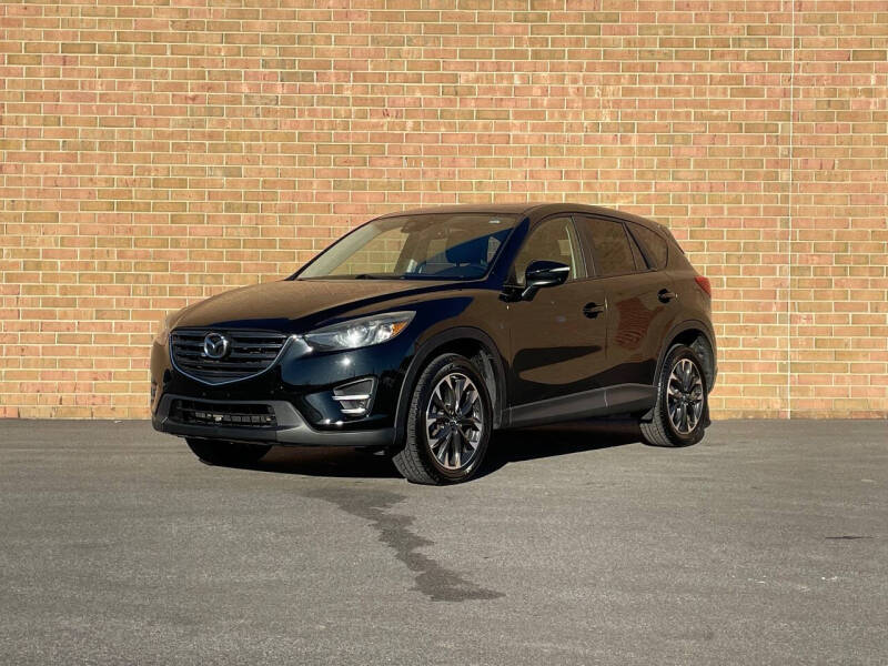 2016 Mazda CX-5 for sale at AMERICAR INC in Laurel MD