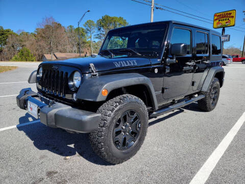 2017 Jeep Wrangler Unlimited for sale at Luxury Cars of Atlanta in Snellville GA
