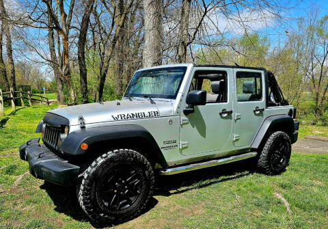 2010 Jeep Wrangler Unlimited for sale at GOLDEN RULE AUTO in Newark OH