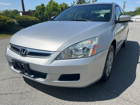 2006 Honda Accord for sale at D'Ambroise Auto Sales in Lowell MA